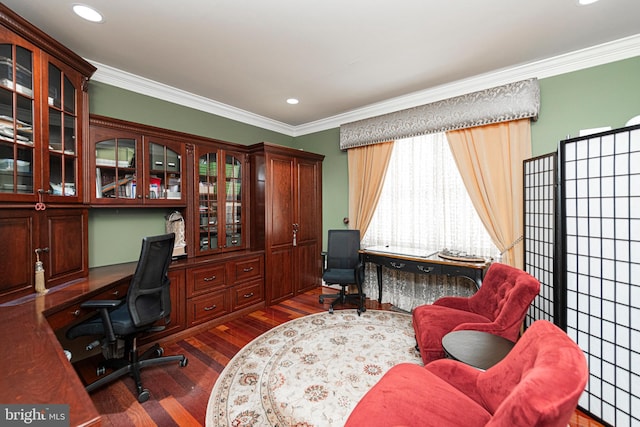 office featuring ornamental molding, built in desk, and dark hardwood / wood-style floors