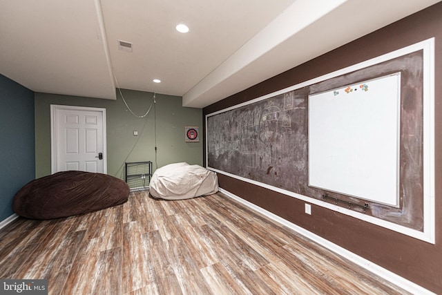 sitting room featuring hardwood / wood-style floors