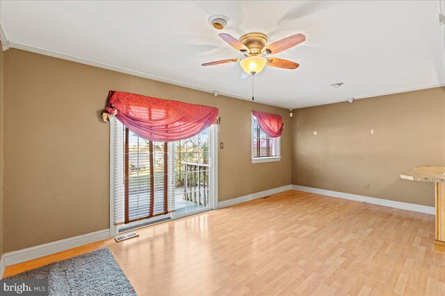 1964 E Oak Rd Unit N2, Vineland, NJ 08361 - unfurnished room with light wood-style floors, a ceiling fan, baseboards, and crown molding