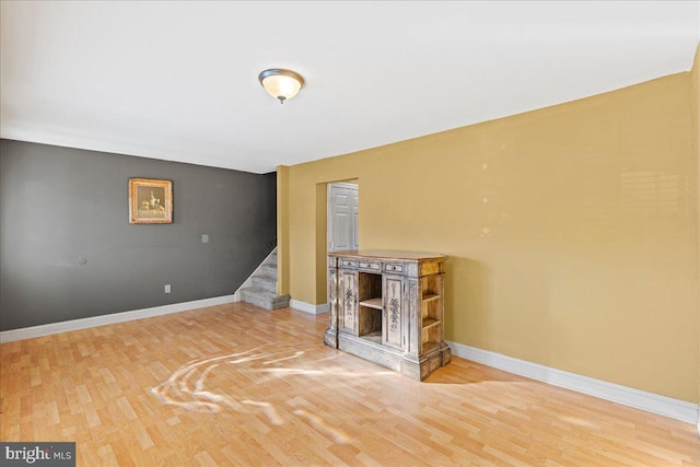 unfurnished living room with hardwood / wood-style floors