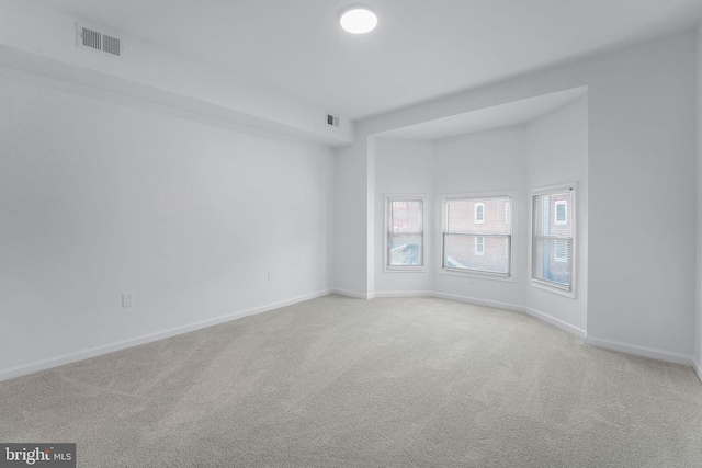 empty room featuring carpet floors