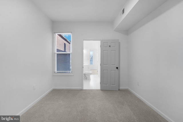 unfurnished room with carpet floors