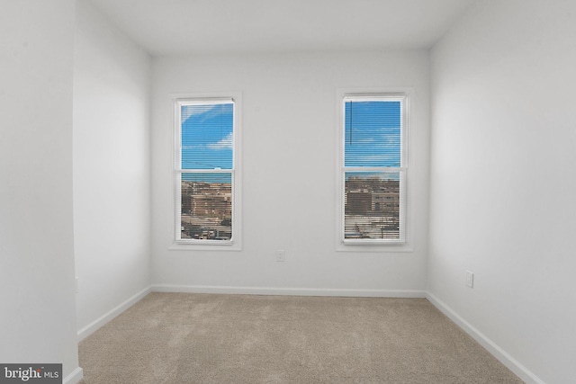 view of carpeted spare room