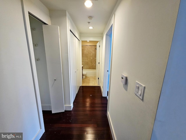 hall featuring dark hardwood / wood-style floors