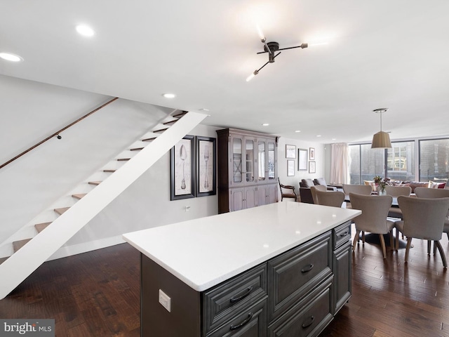 kitchen featuring dark hardwood / wood-style floors and a center island