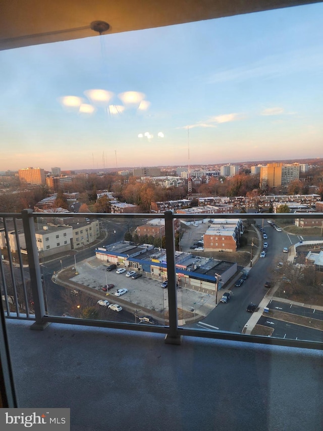 view of balcony at dusk