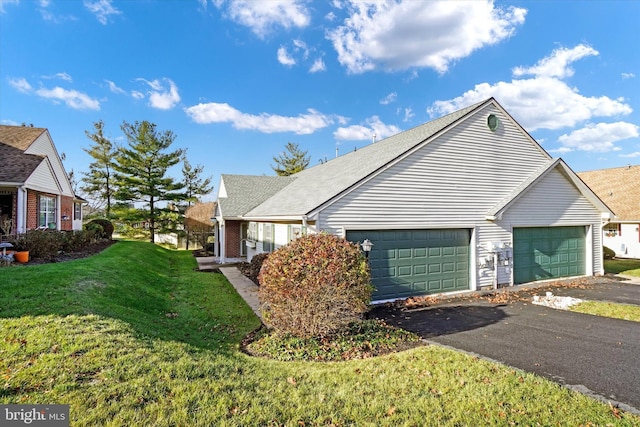 view of property exterior featuring a yard and a garage