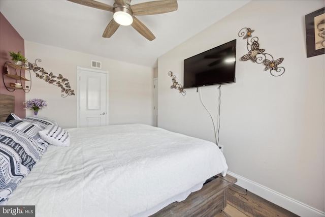 bedroom featuring hardwood / wood-style floors and ceiling fan