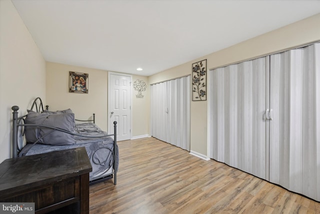 bedroom with light hardwood / wood-style flooring