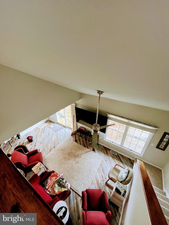 living room featuring vaulted ceiling