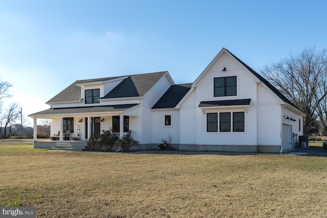 modern farmhouse style home with central AC, a front lawn, covered porch, and a garage