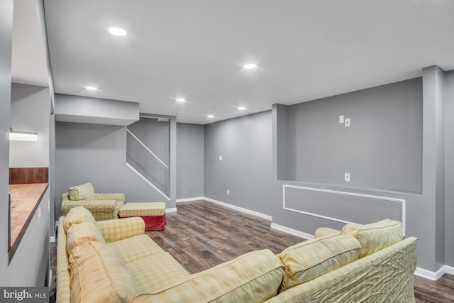 living room featuring dark wood-type flooring