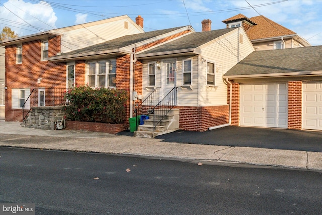 view of front of home with a garage