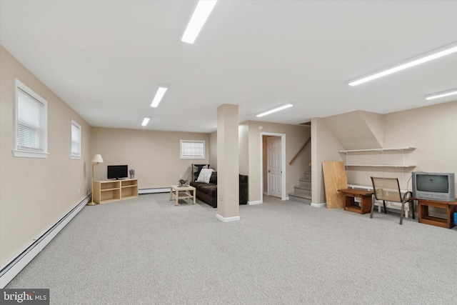 basement featuring carpet and baseboard heating