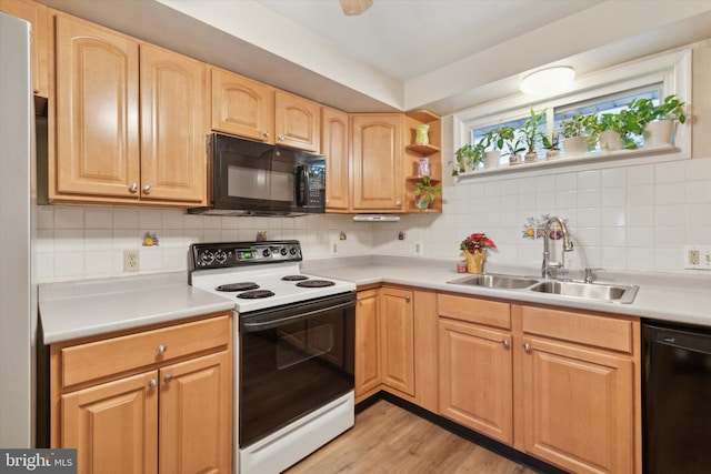 kitchen featuring decorative backsplash, sink, black appliances, light brown cabinets, and light hardwood / wood-style flooring