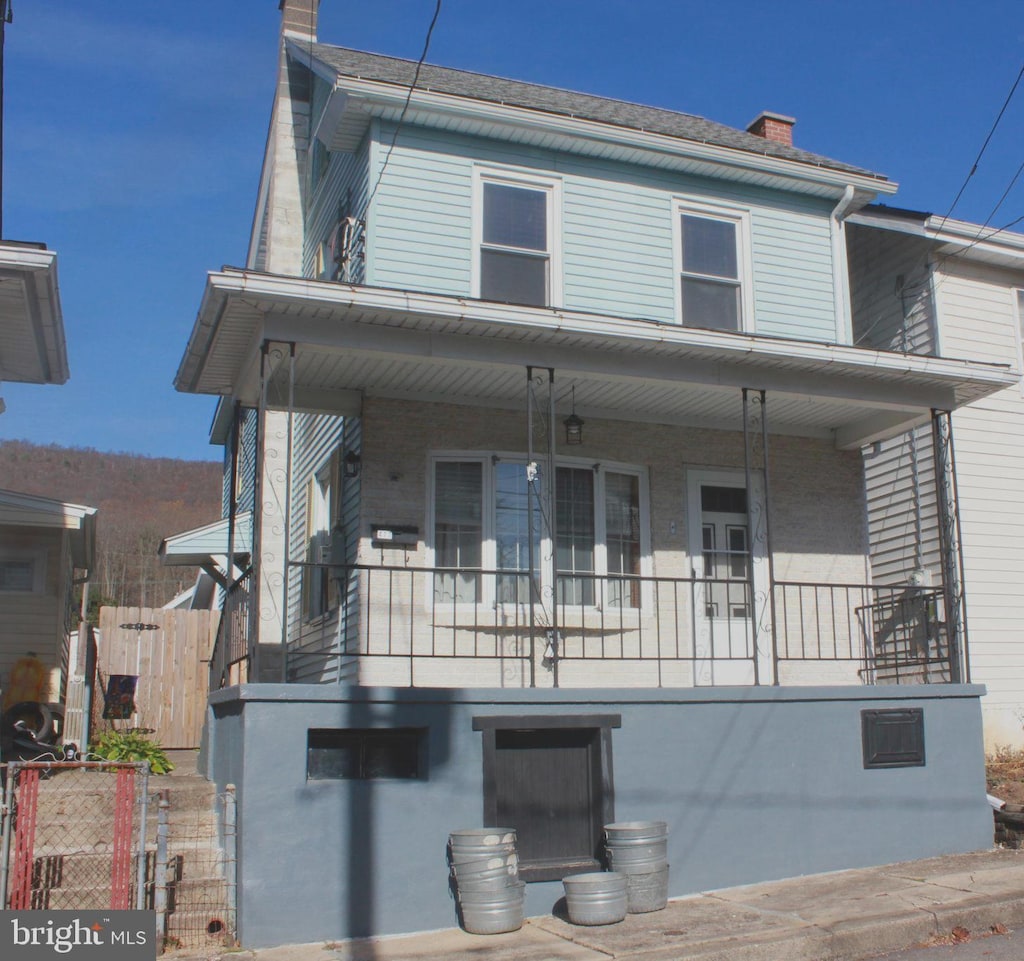 view of front of home featuring covered porch