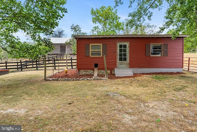 exterior space with a lawn