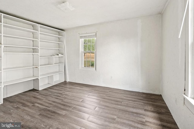 unfurnished room with hardwood / wood-style floors