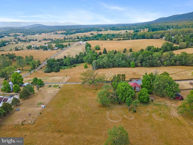 bird's eye view featuring a mountain view and a rural view