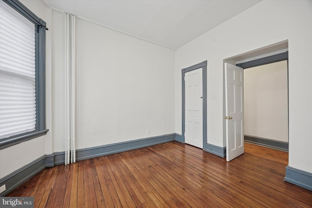 4952 Hazel Ave, Philadelphia, PA 19143 - unfurnished bedroom featuring hardwood / wood-style flooring and baseboards