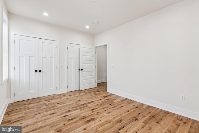 unfurnished bedroom featuring light hardwood / wood-style flooring