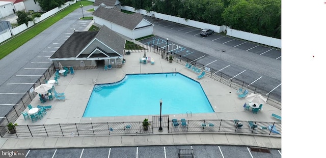 view of pool featuring a patio