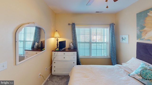 bedroom featuring ceiling fan and carpet flooring