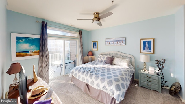 bedroom with ceiling fan, light carpet, and access to exterior