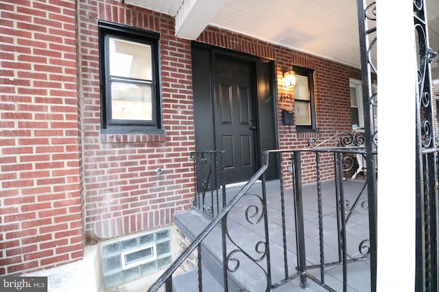 entrance to property with covered porch