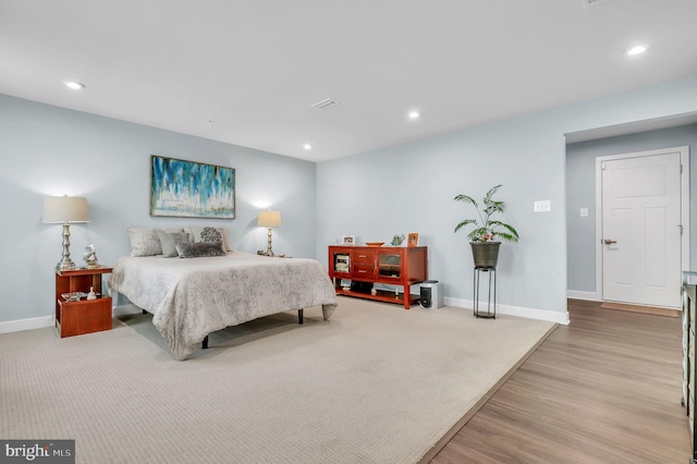 bedroom with light wood-type flooring