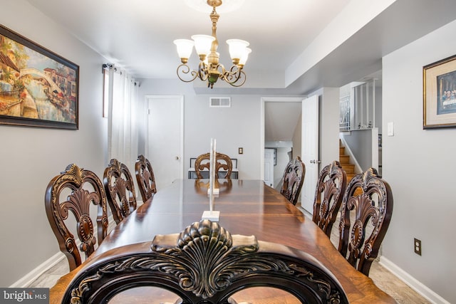 dining area with a chandelier