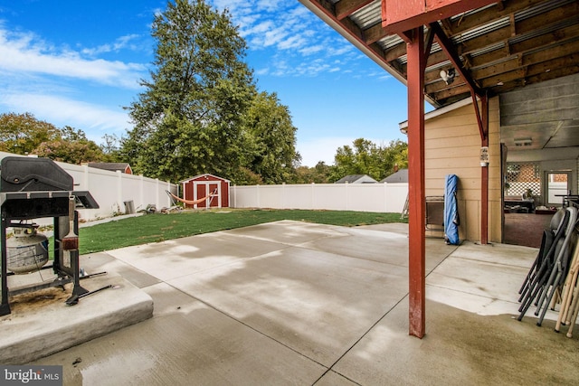 view of patio / terrace with a shed