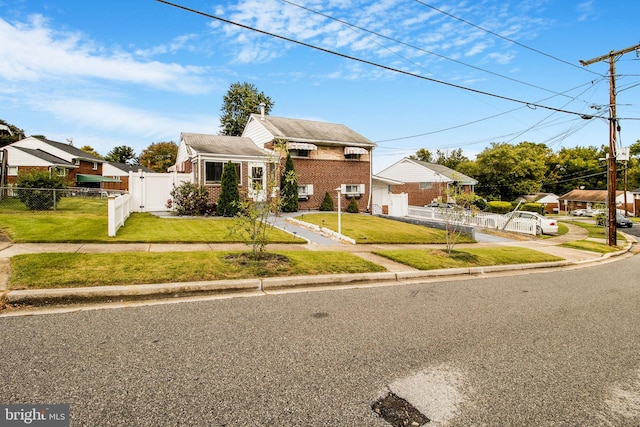 bungalow with a front yard