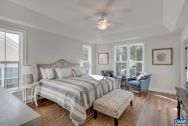 bedroom featuring ceiling fan and hardwood / wood-style flooring