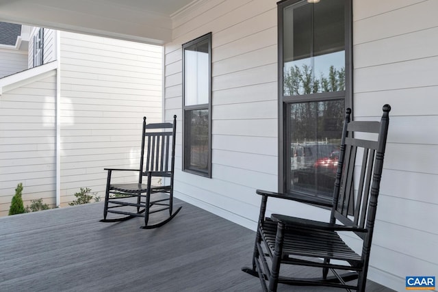 wooden deck featuring a porch