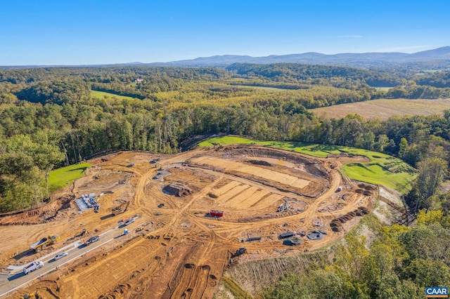 drone / aerial view featuring a mountain view