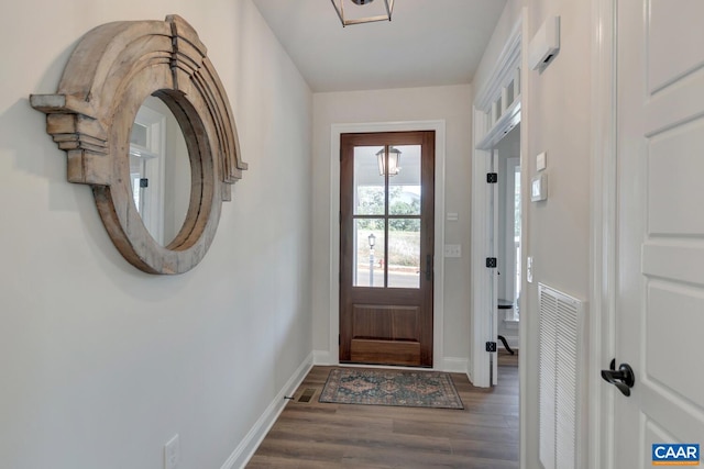 doorway featuring hardwood / wood-style floors