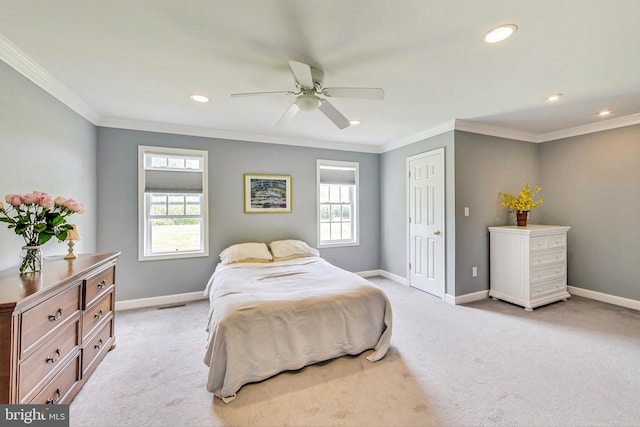 bedroom with light carpet, ceiling fan, and ornamental molding