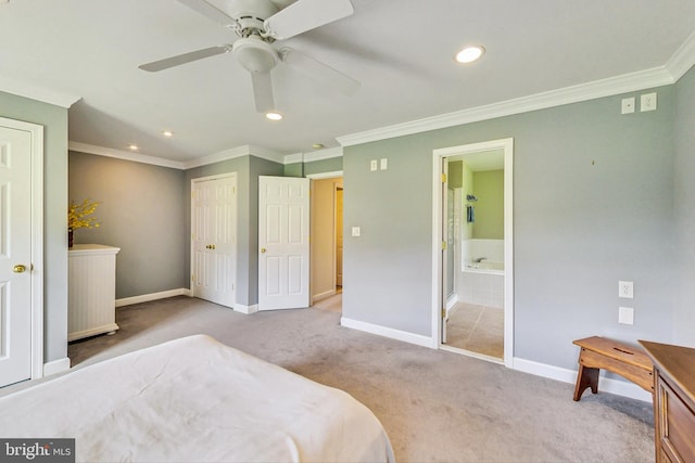 bedroom with light carpet, connected bathroom, ceiling fan, and ornamental molding