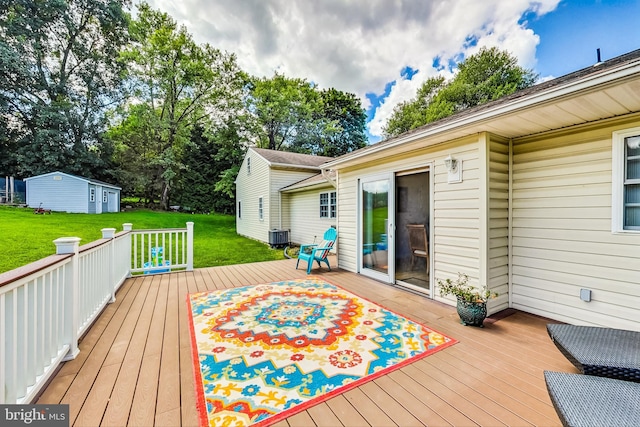 deck with a lawn and cooling unit