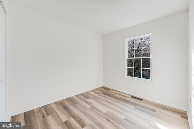 empty room featuring light wood-type flooring