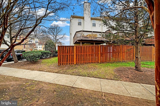 view of yard featuring a wooden deck