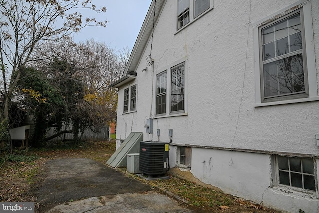 view of property exterior featuring central AC unit