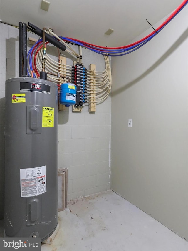 utility room with water heater