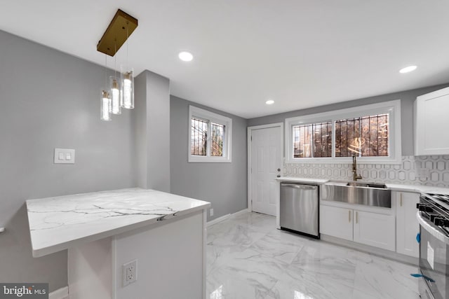 kitchen with white cabinetry, dishwasher, a healthy amount of sunlight, and sink