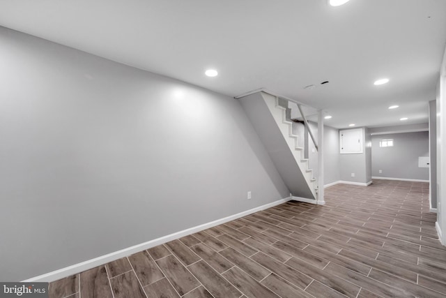 basement featuring light hardwood / wood-style flooring