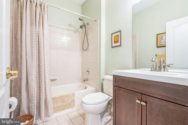 full bathroom featuring tile patterned floors, vanity, shower / bath combination with curtain, and toilet