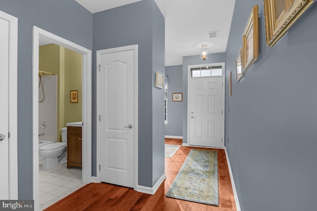 entryway with light wood-type flooring