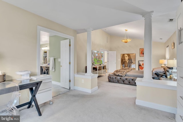 216 Pelagic Ln, Solomons, MD 20688 - living room with ornate columns, light carpet, and baseboards