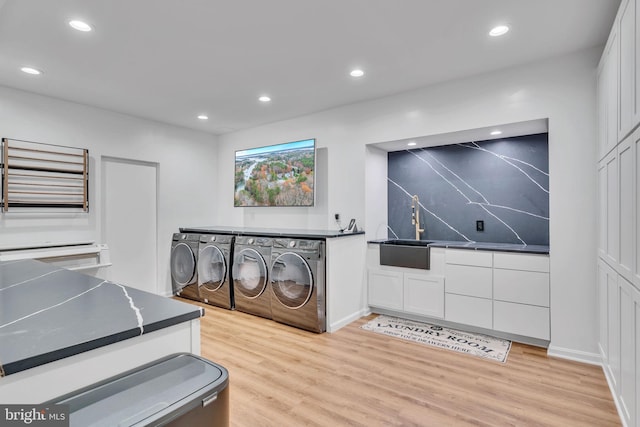 216 Pelagic Ln, Solomons, MD 20688 - washroom featuring washing machine and dryer, light wood-style floors, a sink, and recessed lighting